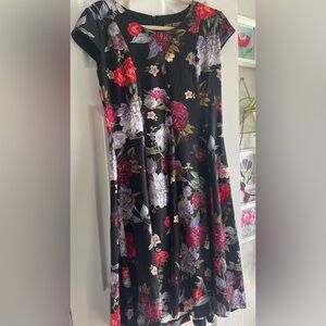 Floral dress with swing style skirt by Marc Bouwer